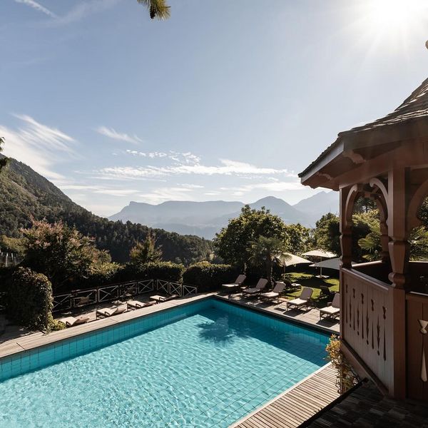 Enjoy the last golden days of autumn by the pool, surrounded by the vibrant colors of the...