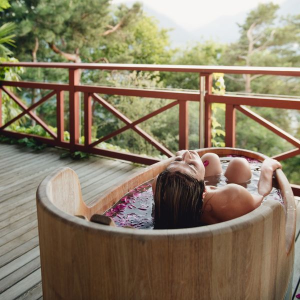 Bathe in our oneof a-kind wooden hot tub, with panoramic view. Surrounded by whispering trees...